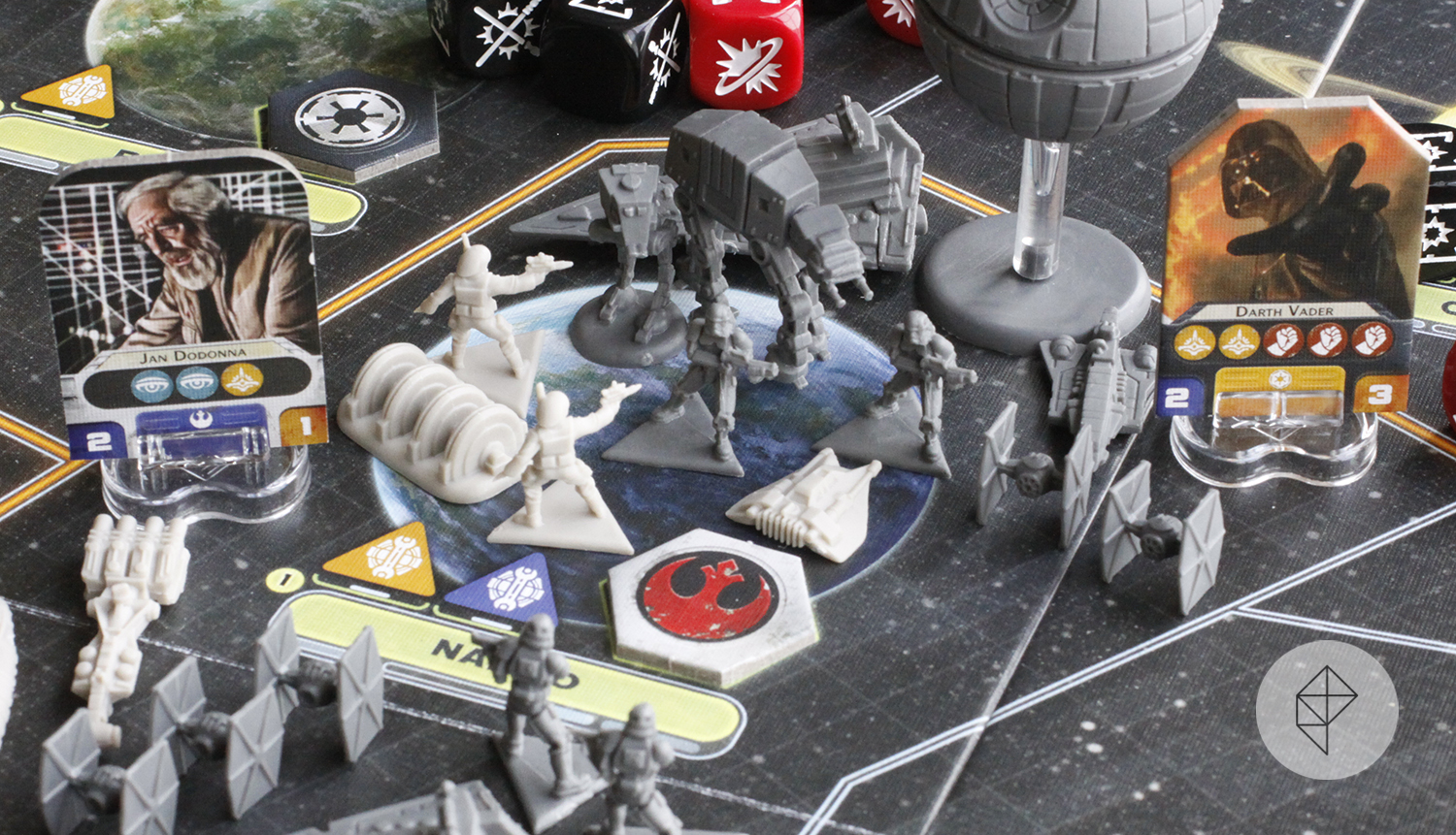 A battle on the planet Naboo in Star Wars Rebellion. The board is filled with plastic miniatures, including rebel commandoes, storm troopers, and AT-AT.