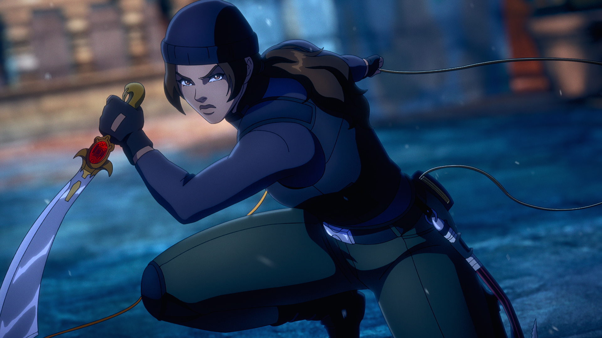 Lara Croft, wearing a stealthy black suit, holds a scimitar in her right hand as she crouches ready to strike in a still from the Tomb Raider: The Legend of Lara Croft animated series